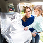 Woman putting the Cool 'N Cover Car Seat Heat Shield and Sun Shade on a car seat in the vehicle