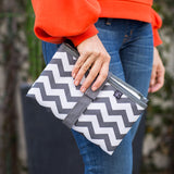 Woman holding Full Body Changing Pad, grey chevron
