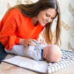 Full Body Changing Pad, grey chevron with baby laying on it