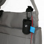 The Bag ‘N Bags Bag Dispenser is a fabric, duffle-style dispenser that conveniently holds 1 roll of 15 disposable bags that are perfect to hide all evidence of dirty diapers, messy bibs, wet clothing, and more.