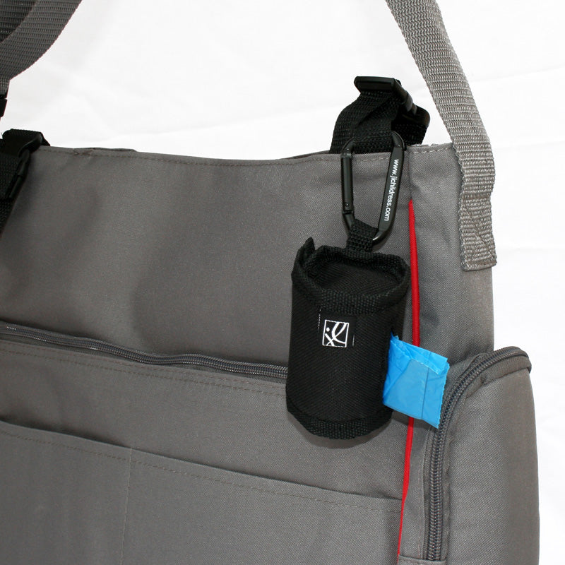 The Bag ‘N Bags Bag Dispenser is a fabric, duffle-style dispenser that conveniently holds 1 roll of 15 disposable bags that are perfect to hide all evidence of dirty diapers, messy bibs, wet clothing, and more.