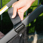 Close up picture of strap that hooks the Disney Baby Side Sling Stroller Cargo Net to your stroller