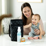 Woman and baby sitting at table with Disney Baby 6 Bottle Cooler, Mickey Black