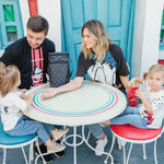 Family sitting at table with Disney Baby 6 Bottle Cooler, Mickey Black