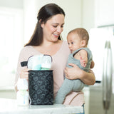 Woman and baby standing next to counter with Disney Baby TwoCOOL Double Bottle Cooler, Mickey Black on it