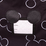 Close up picture of Mickey shaped ID tag on the Disney Baby Ultimate Padded Backpack Car Seat Travel Bag, Mickey Black