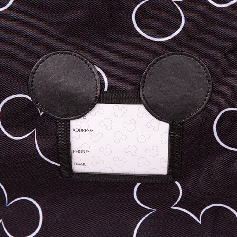 Close up picture of Mickey shaped ID tag on the Disney Baby Ultimate Padded Backpack Car Seat Travel Bag, Mickey Black