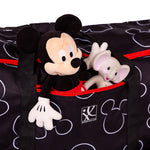 Stuffed animals inside the front pocket on the Disney Baby Single & Double Stroller Travel Bag, Mickey Black