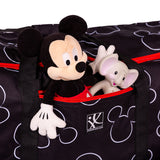 Stuffed animals inside the front pocket on the Disney Baby Single & Double Stroller Travel Bag, Mickey Black