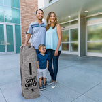 Family standing next to Deluxe Gate Check Travel Bag for Umbrella Strollers